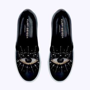 KURT GEIGER
The Leah Eye sneaker slips on in black leather.